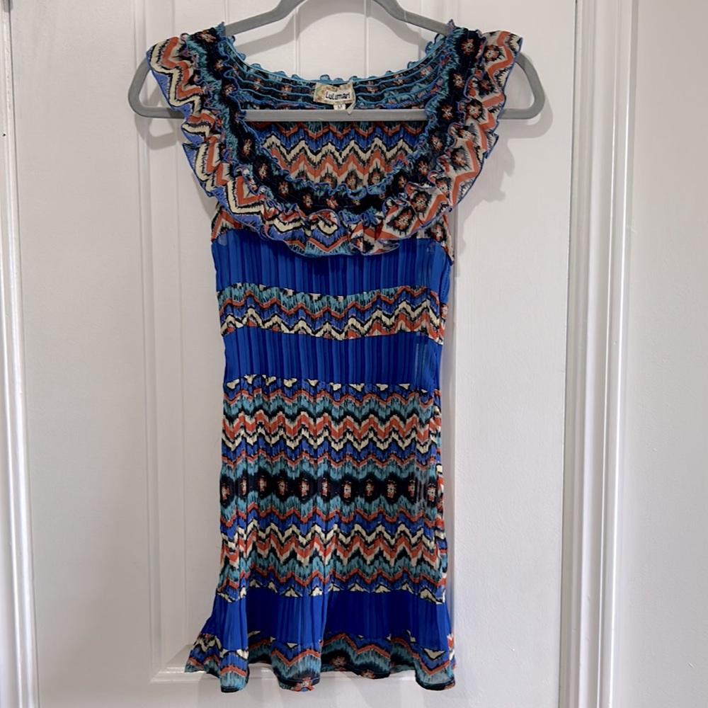 Lulumari Aztec Print stretchy soft longer sleeveless blouse with ruffle neck